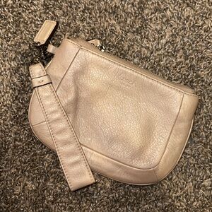 Tan leather Coach wristlet